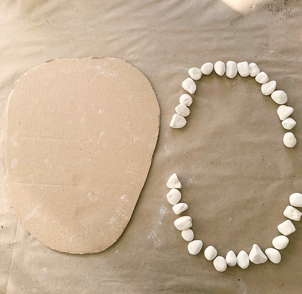 teeth mouth anatomy learning activity for kids made out of rocks and cardboard