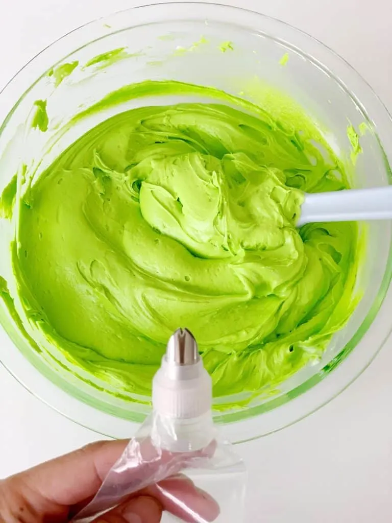 green vanilla buttercream frosting with leaf tip