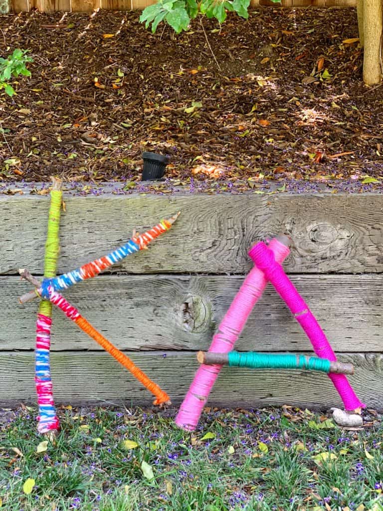 giant yarn wrapped stick letters nature craft