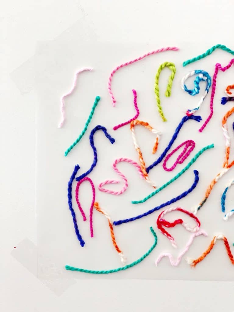 Sticky Wall Yarn Sensory Activity For Babies and Toddlers