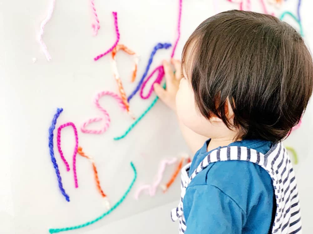 Sticky Wall Yarn Sensory Activity For Babies and Toddlers