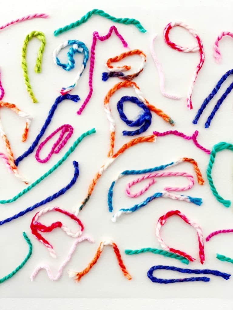 Sticky Wall Yarn Sensory Activity For Babies and Toddlers