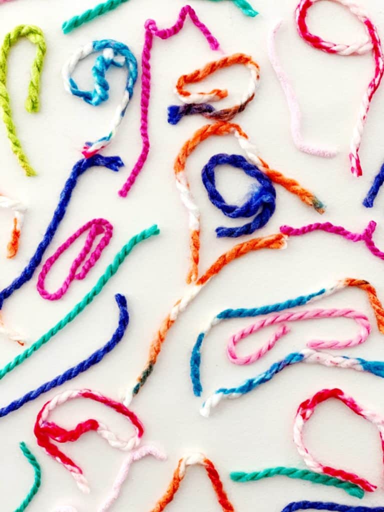 Sticky Wall Yarn Sensory Activity For Babies and Toddlers