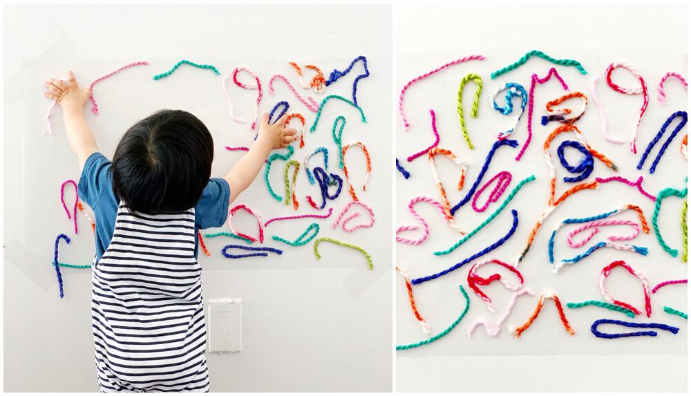 STICKY WALL YARN SENSORY ACTIVITY FOR BABIES AND TODDLERS hello
