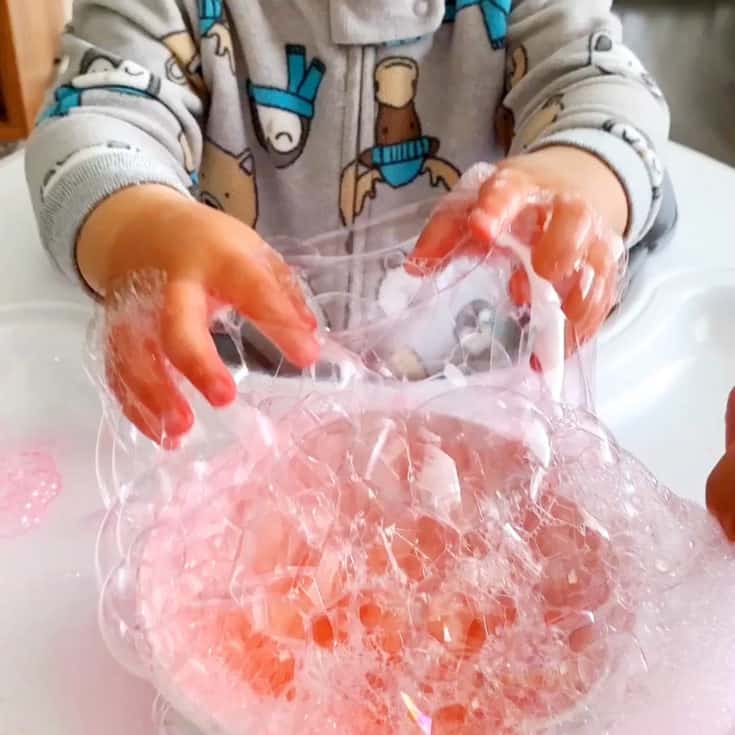 BLOWING BUBBLES SENSORY PLAY FOR BABIES AND TODDLERS
