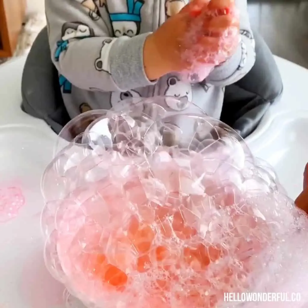 blowing bubbles sensory play for babies and toddlers