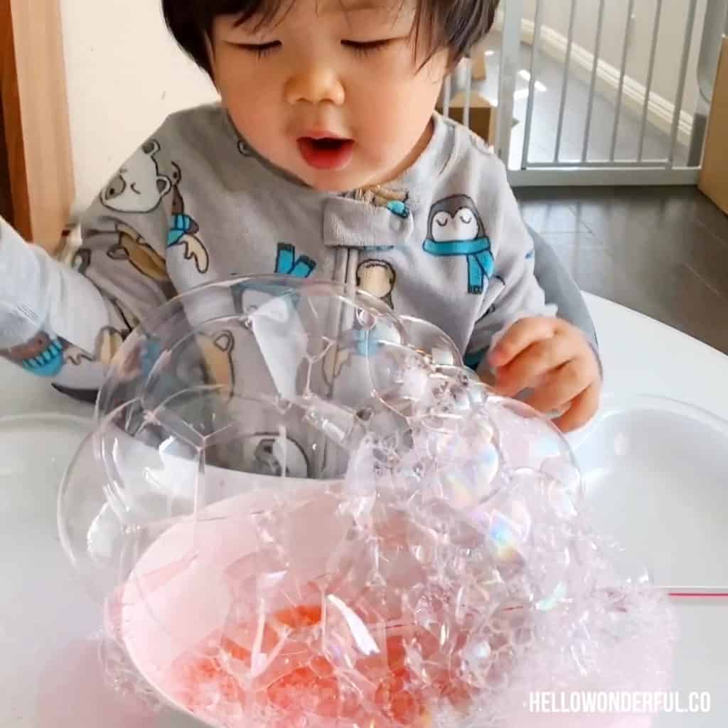 blowing bubbles sensory play for babies and toddlers