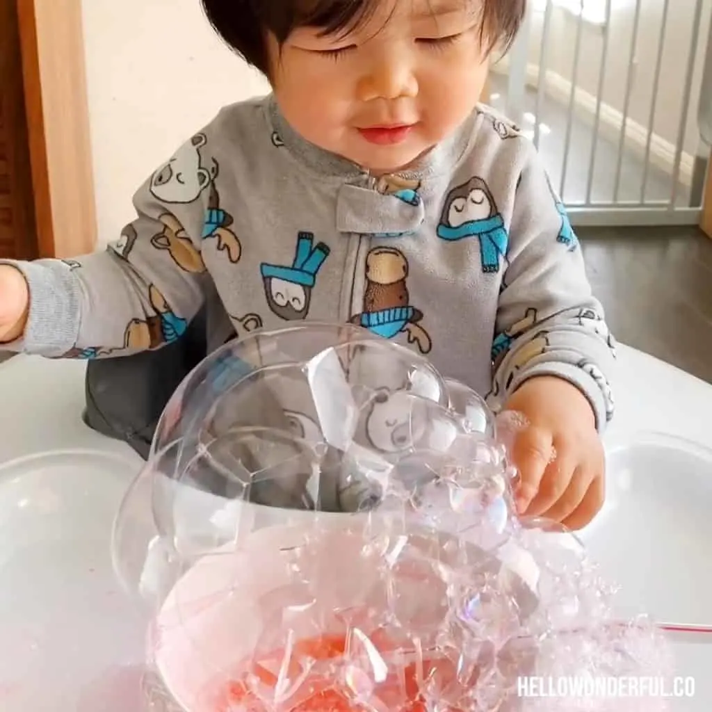 blowing bubbles sensory play for babies and toddlers