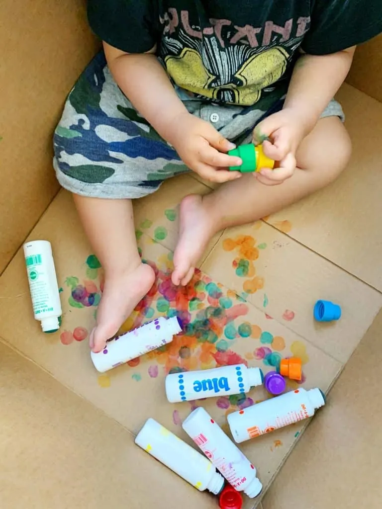 Baby Toddler Painting in a Cardboard Box