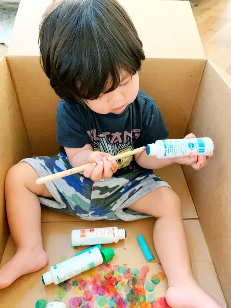 Baby Toddler Painting in a Cardboard Box with dot markers