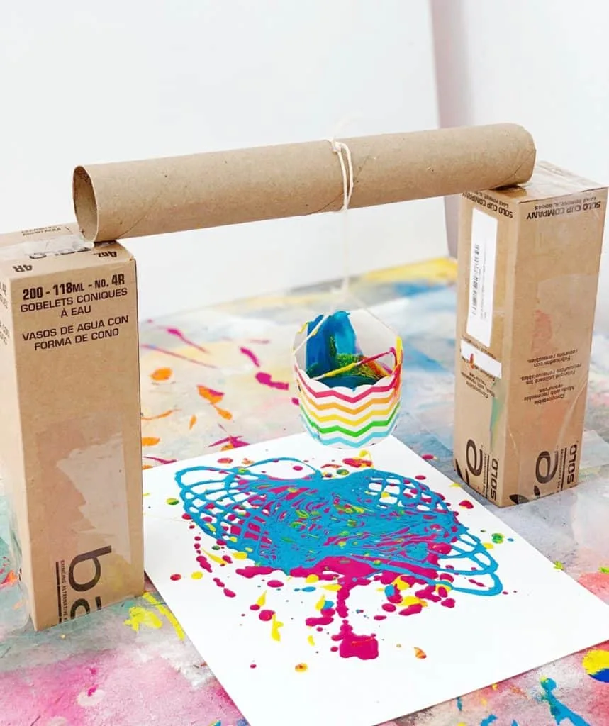 Pendulum Painting With Kids using recycled materials