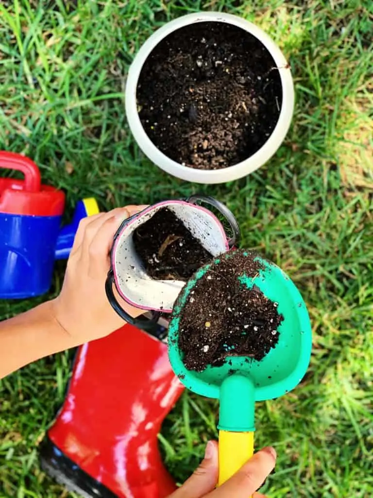 diy rain boot planters - gardening with kids 