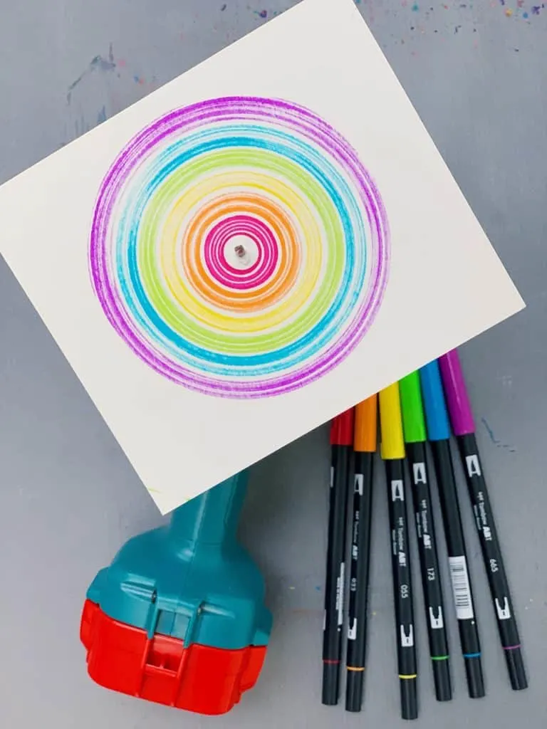 drill spin art with kids - rainbow colors