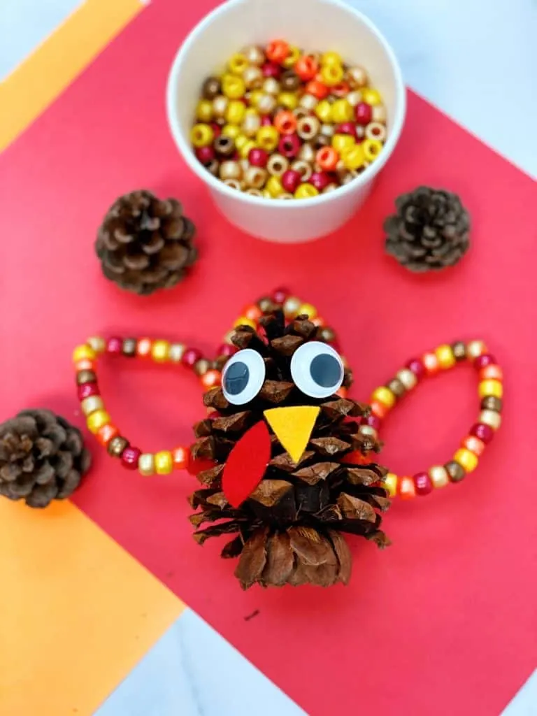 Fine Motor Pine Cone Turkey Craft for preschoolers