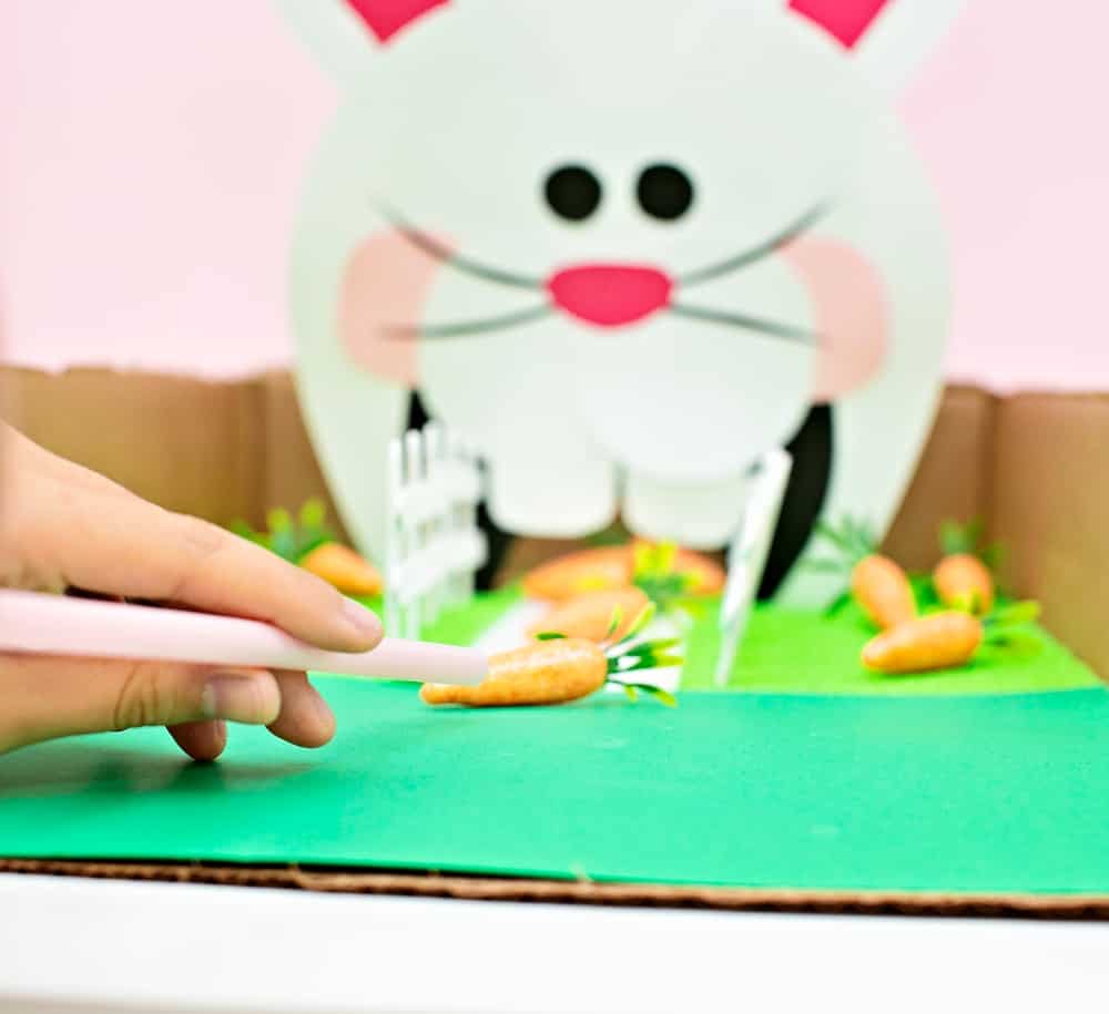 Feed the Bunny Easter Game for Kids with Free Printable. Fun fine motor skills. 