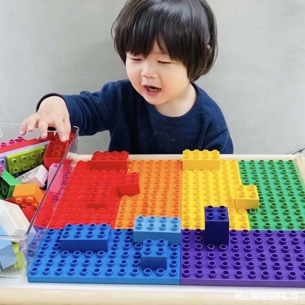 DIY LEGO Tray Table holds DUPLO too great for toddlers and preschoolers. 