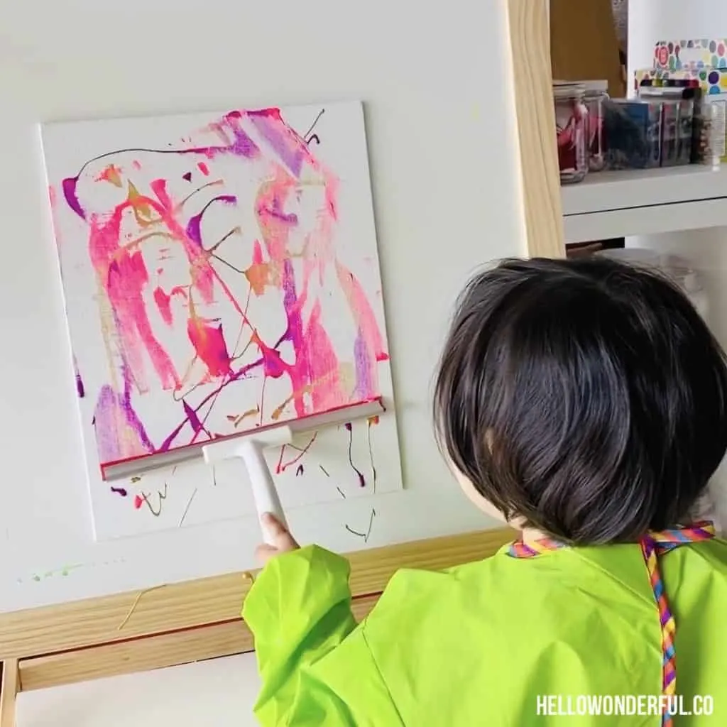 squeegee painting with toddlers. Fun low-mess painting with beautiful results