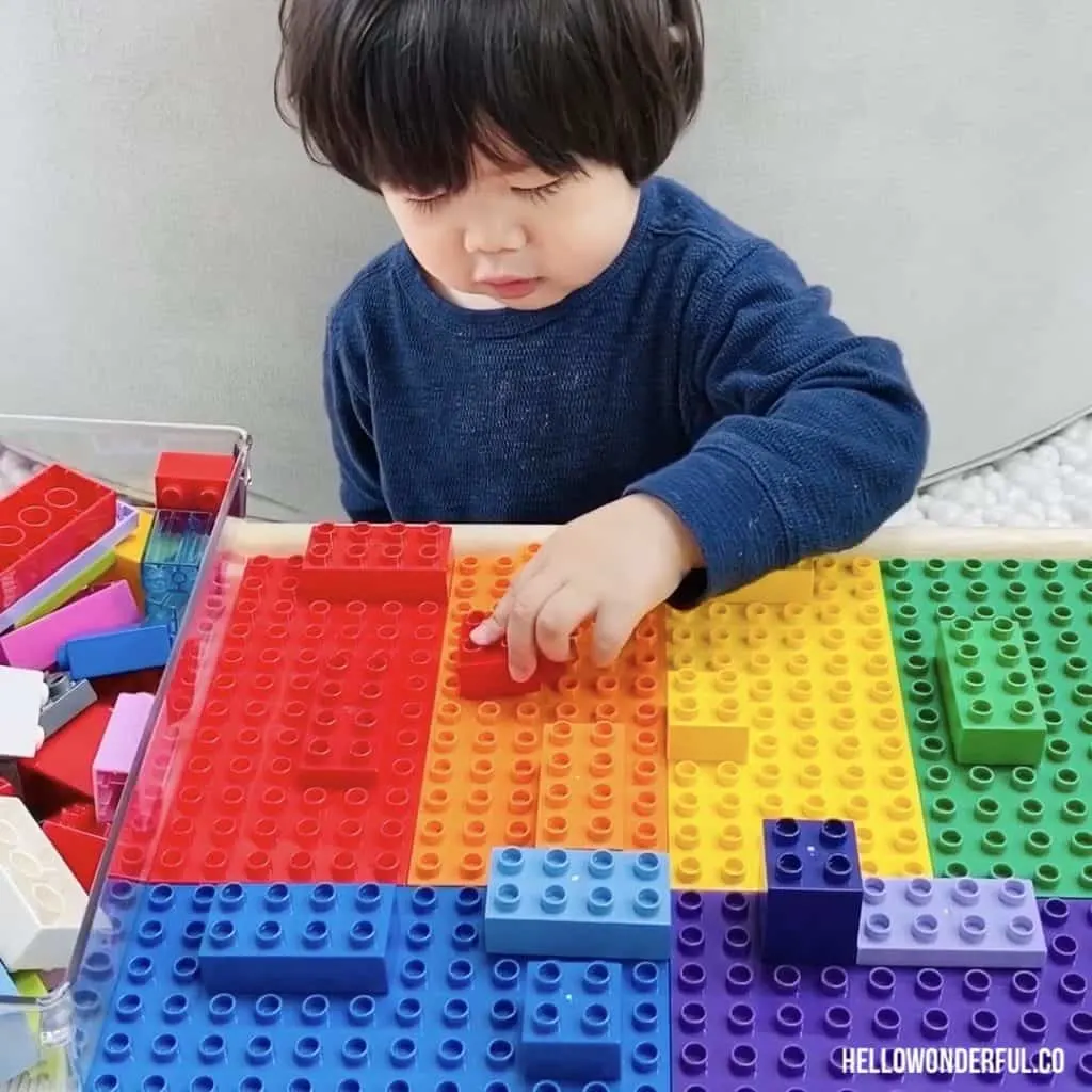 DIY LEGO Tray Table holds DUPLO too great for toddlers and preschoolers. 