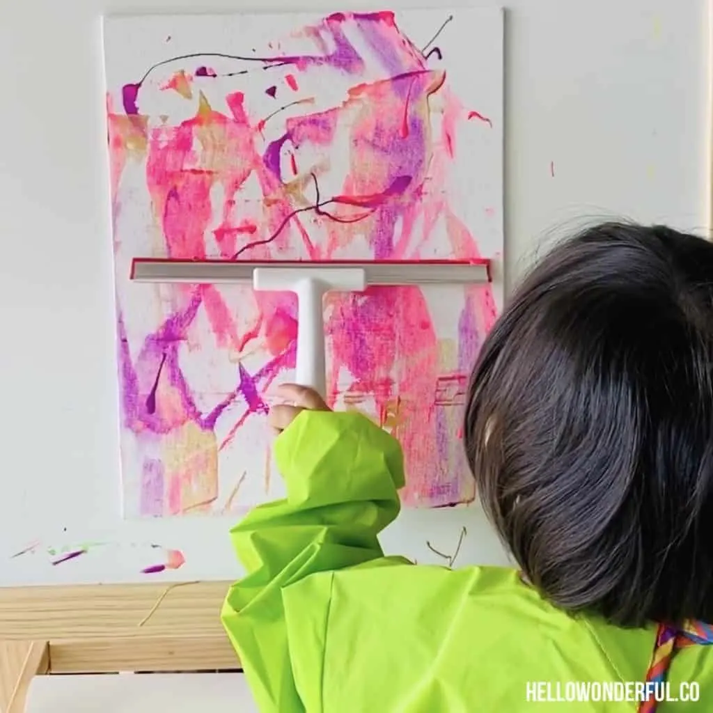 squeegee painting with toddlers. Fun low-mess painting with beautiful results