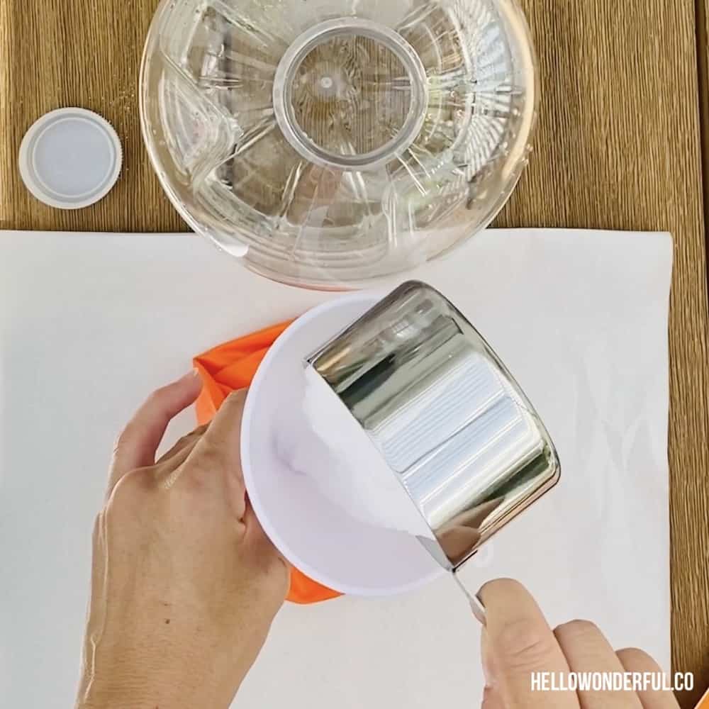 Adding baking soda inside balloon for vinegar experiment