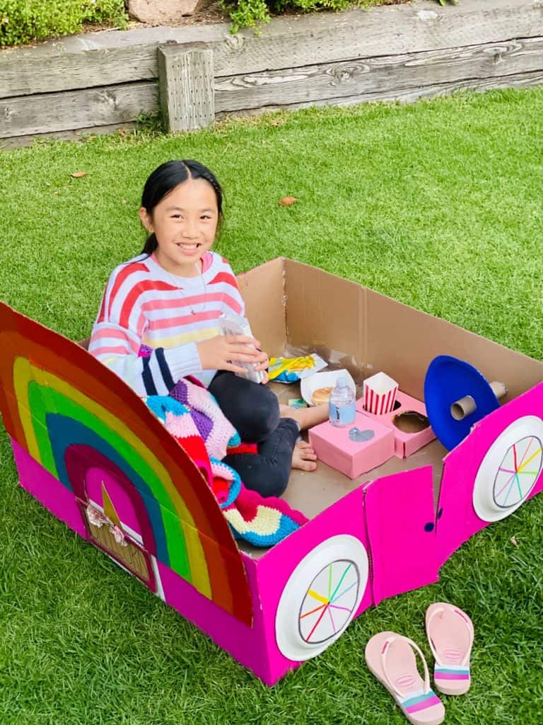 rainbow unicorn cardboard car for outdoor movie night 