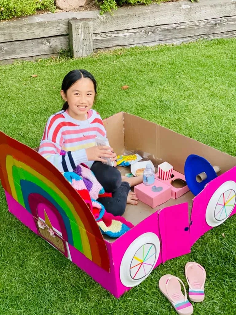 rainbow unicorn cardboard car for outdoor movie night 