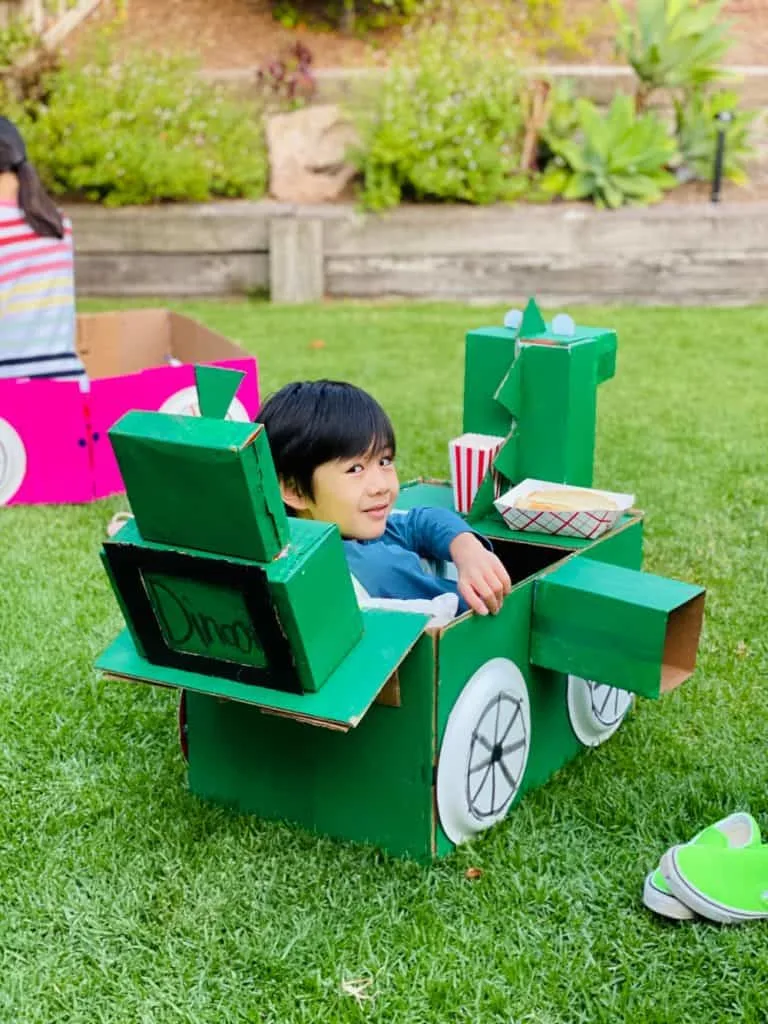 dinosaur cardboard car for outdoor movie night 