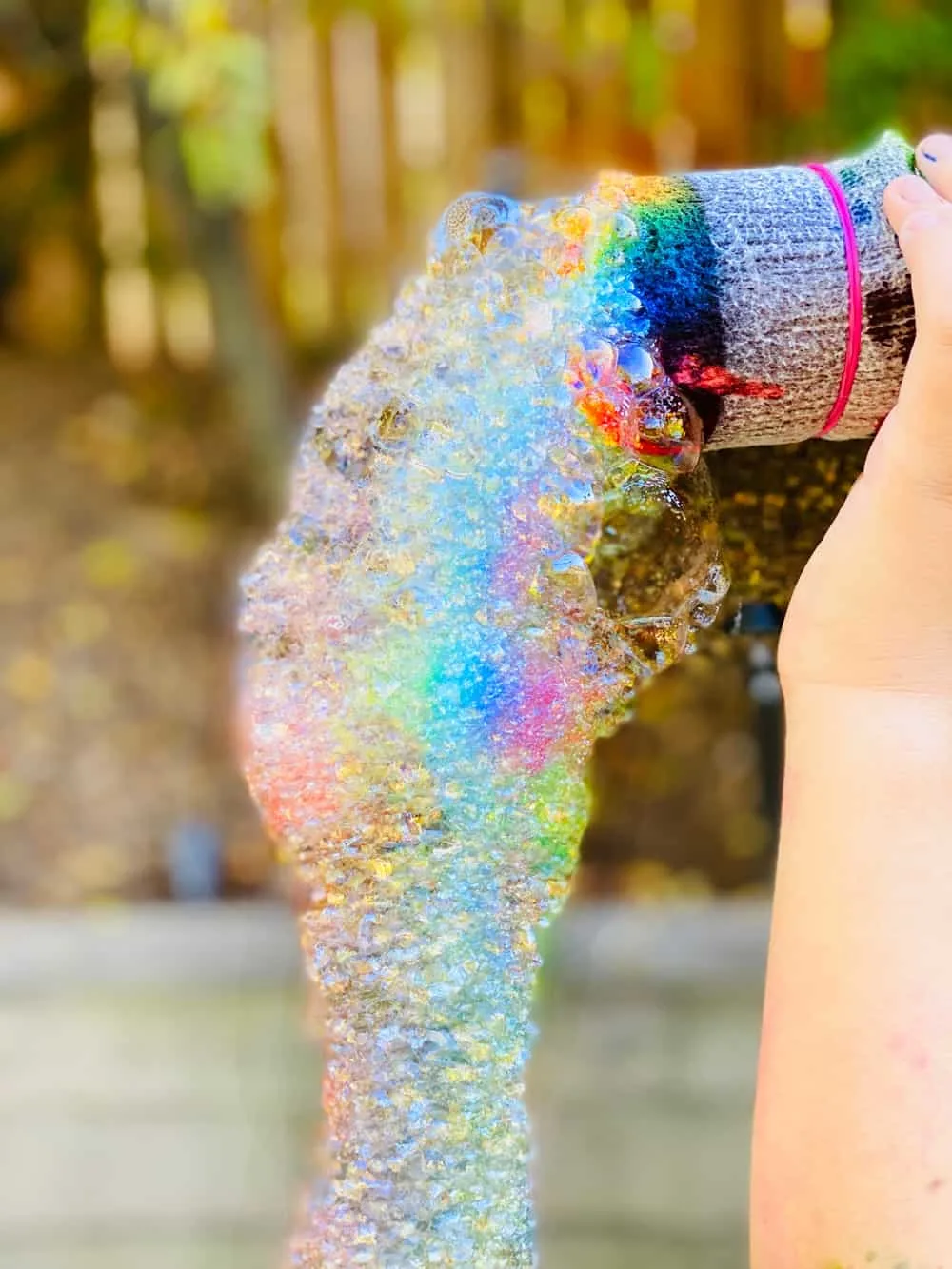 how to make rainbow bubbles with a bottle and sock 