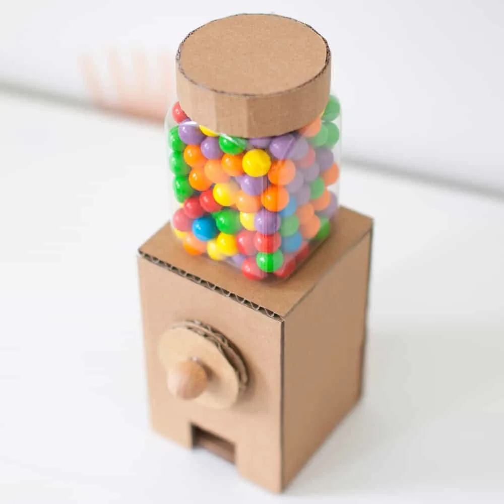 showing top down of a cardboard gumball machine 