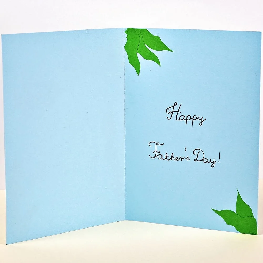 Inside of a blue diy father's day fish card 