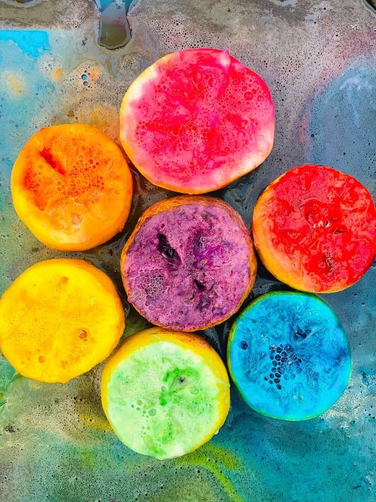 lemon volcano eruptions in rainbow colors from kid science experiment