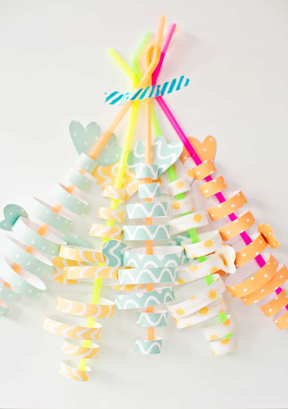 paper fish craft made from colorful strips of paper and straws 