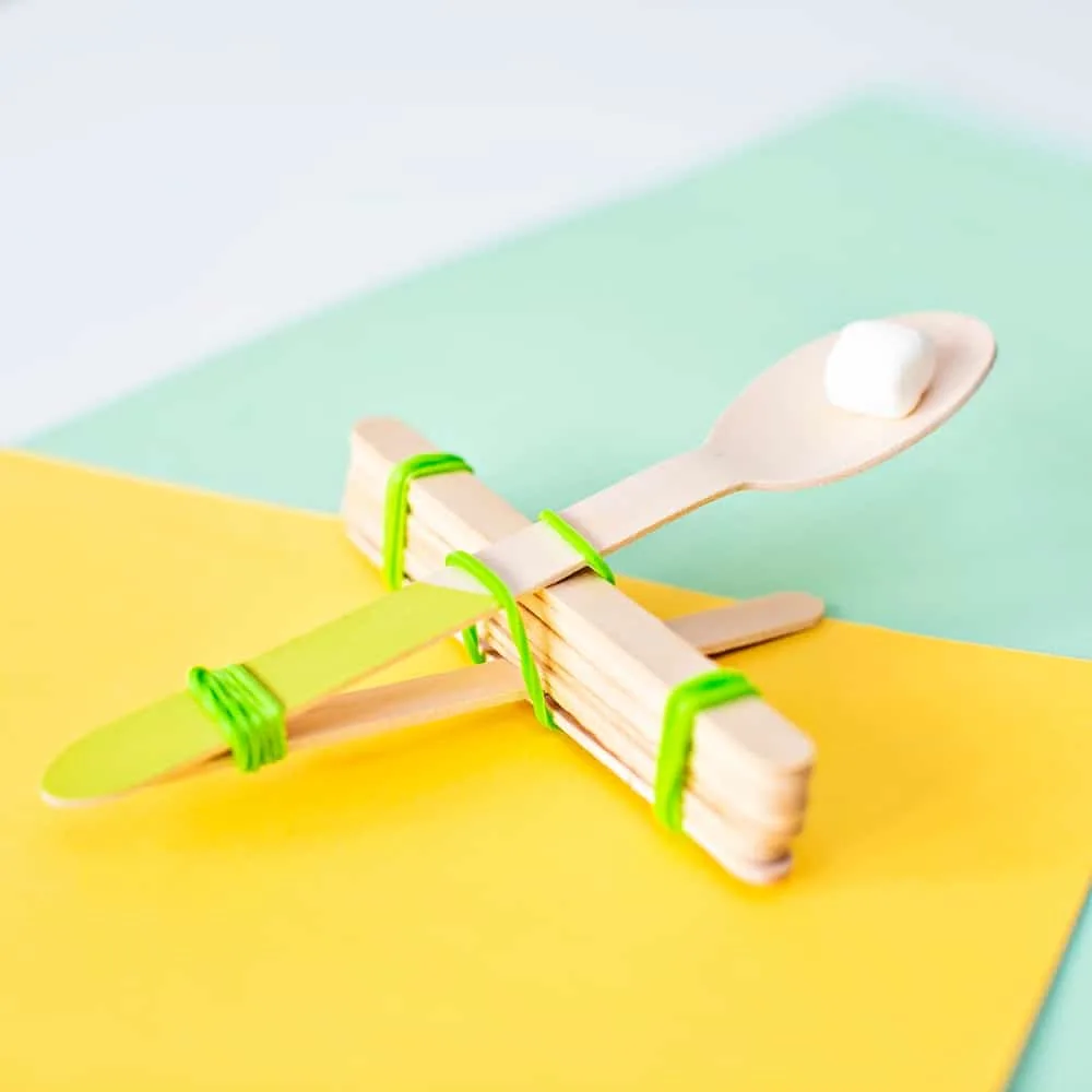 diy marshmallow catapult with spoon and popsicle sticks