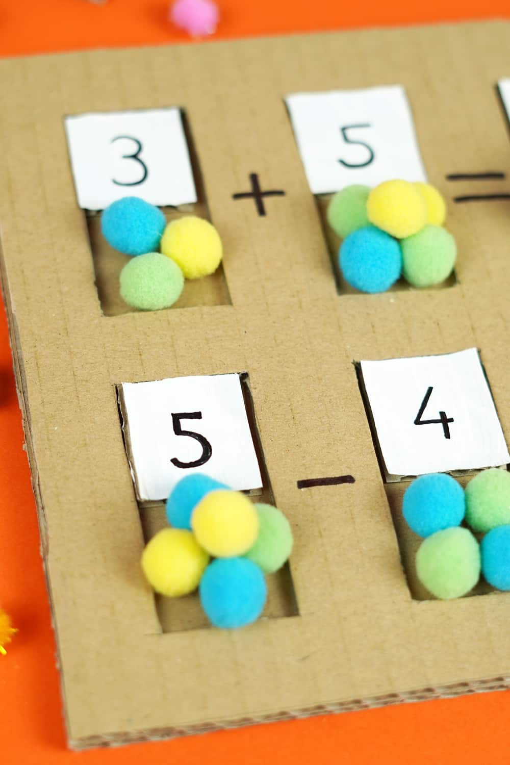 cardboard math puzzle with pom poms for early kids math learning 