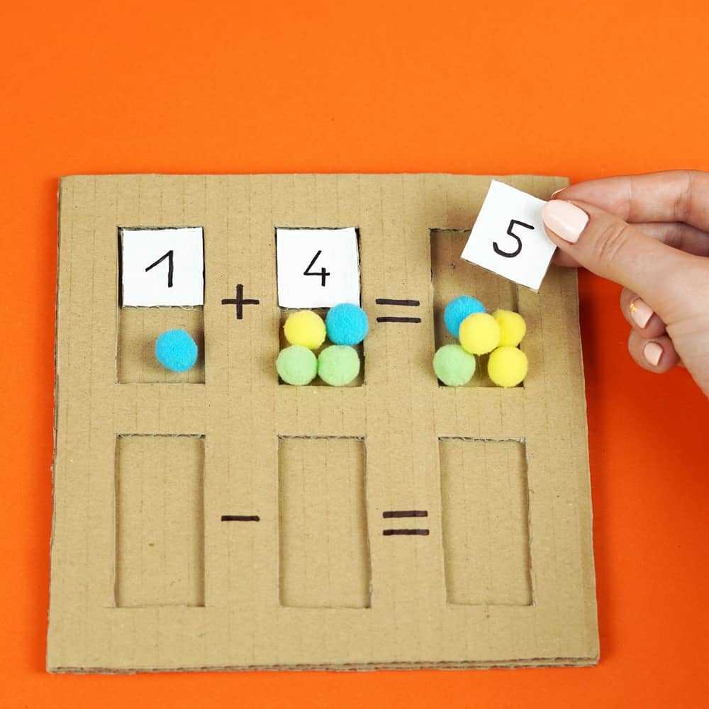 cardboard math puzzle with pom poms for early kids math learning 