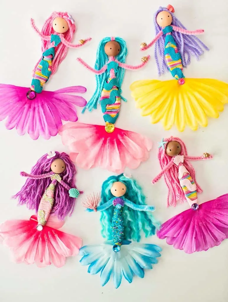 diy mermaid dolls made with pipe cleaners, flowers, yarns and ribbon