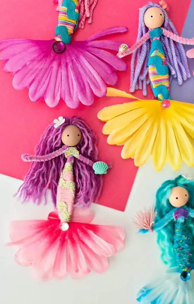 pipe cleaner mermaid dolls made with flowers, yarns and ribbon