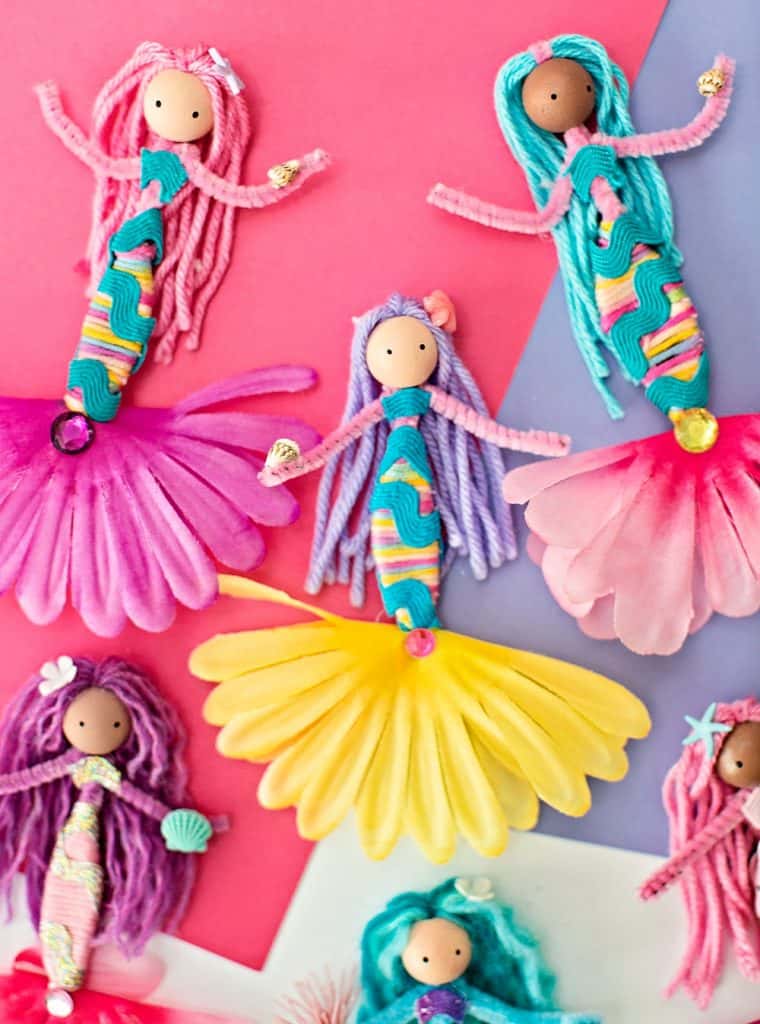 diy mermaid dolls made with pipe cleaners, flowers, yarns and ribbon