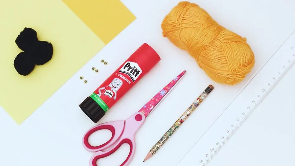 materials to make bee craft out of pom poms