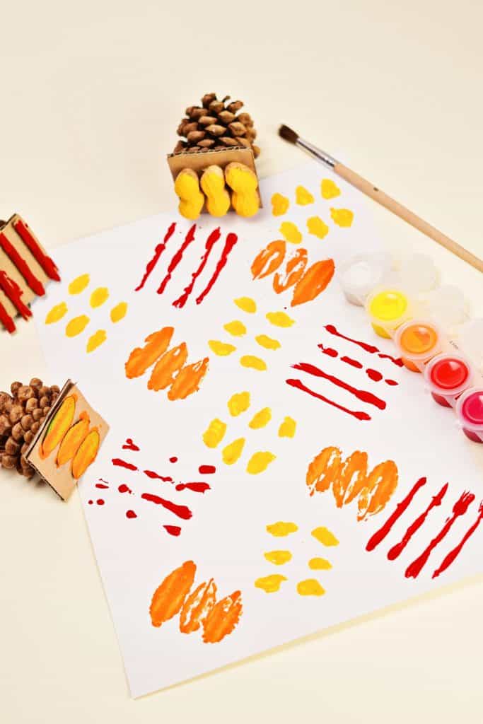 fall art stamps using pine cones and fall foliage