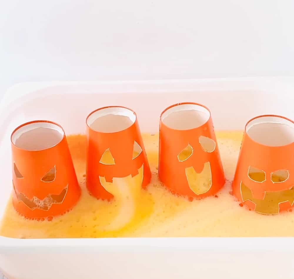 Pumpkin Baking Soda Vinegar Science Experiment. Use cups and carve out Jack O'Lantern faces to do this classic Halloween science project. 