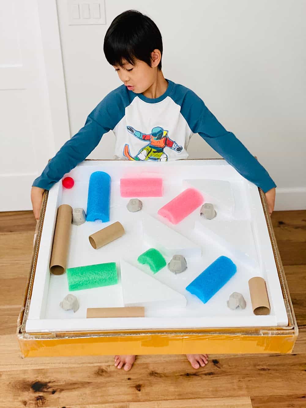 Giant Cardboard Ball Maze Fun recycled STEM project for kids