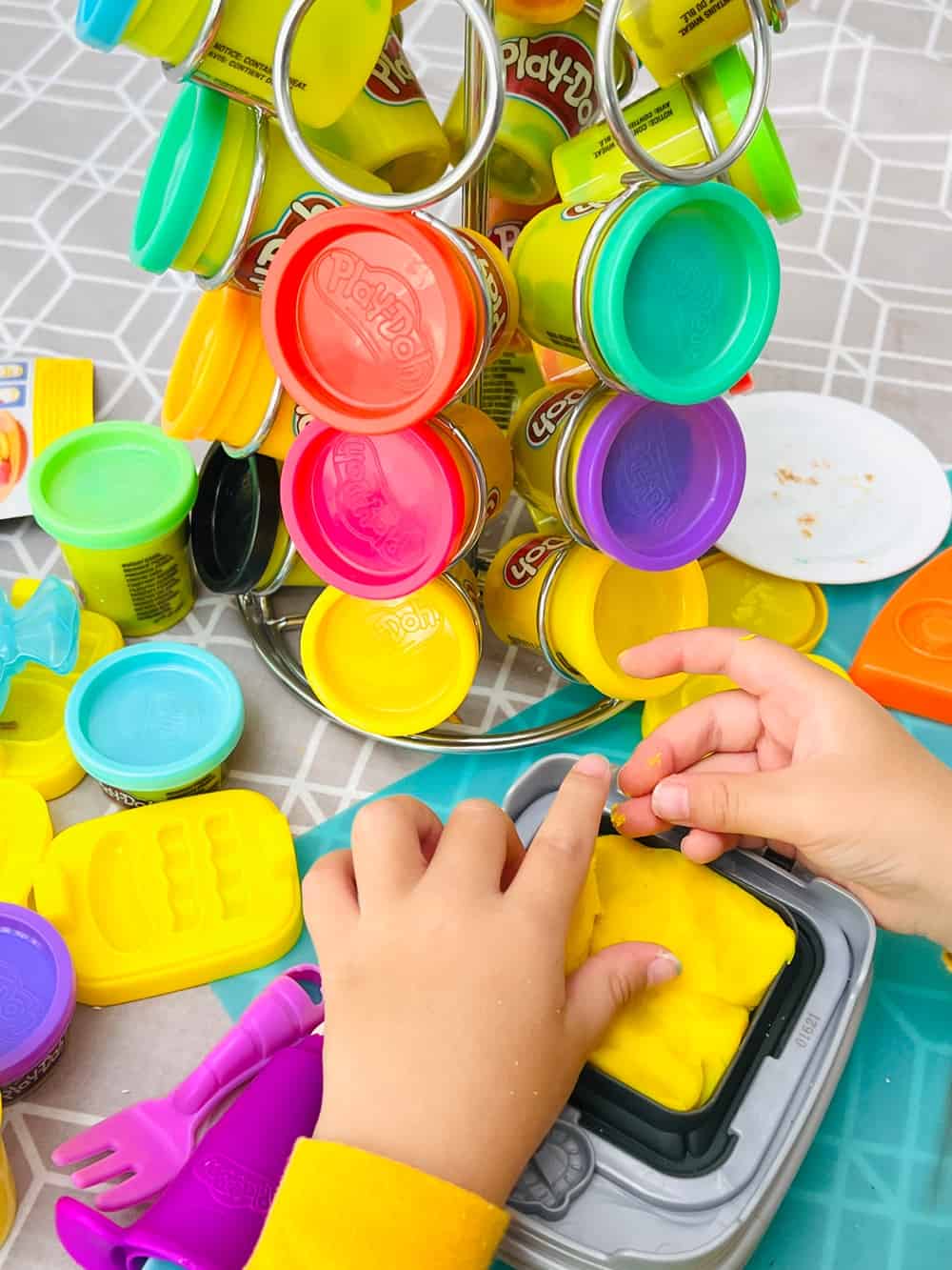 Play-Doh carousel, puzzle box, more: Toy organization hacks for parents