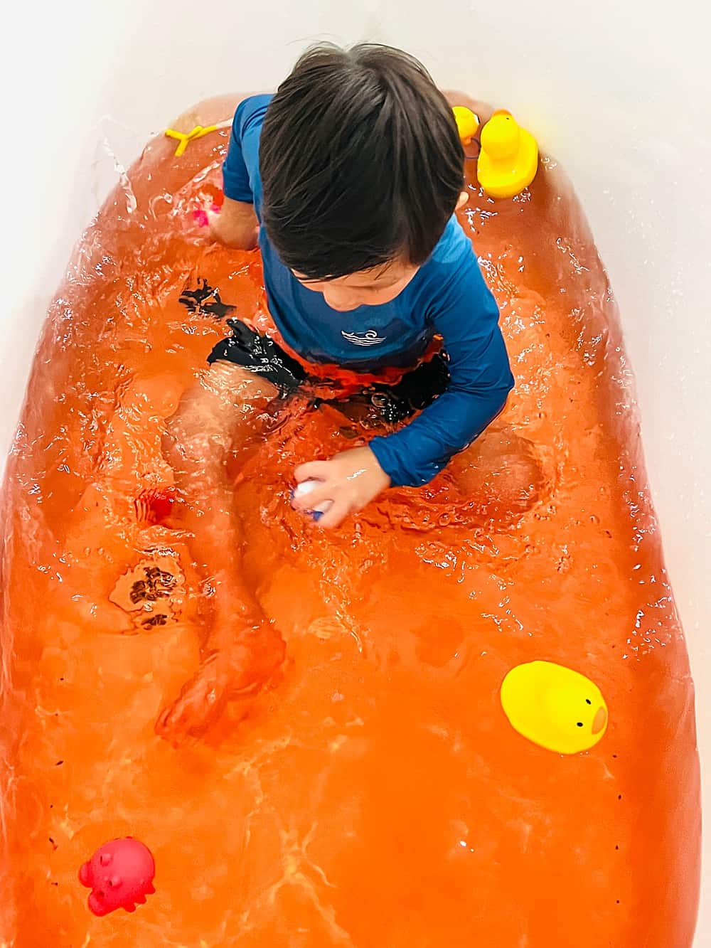 Children bath color transforms the bath water into a colorful