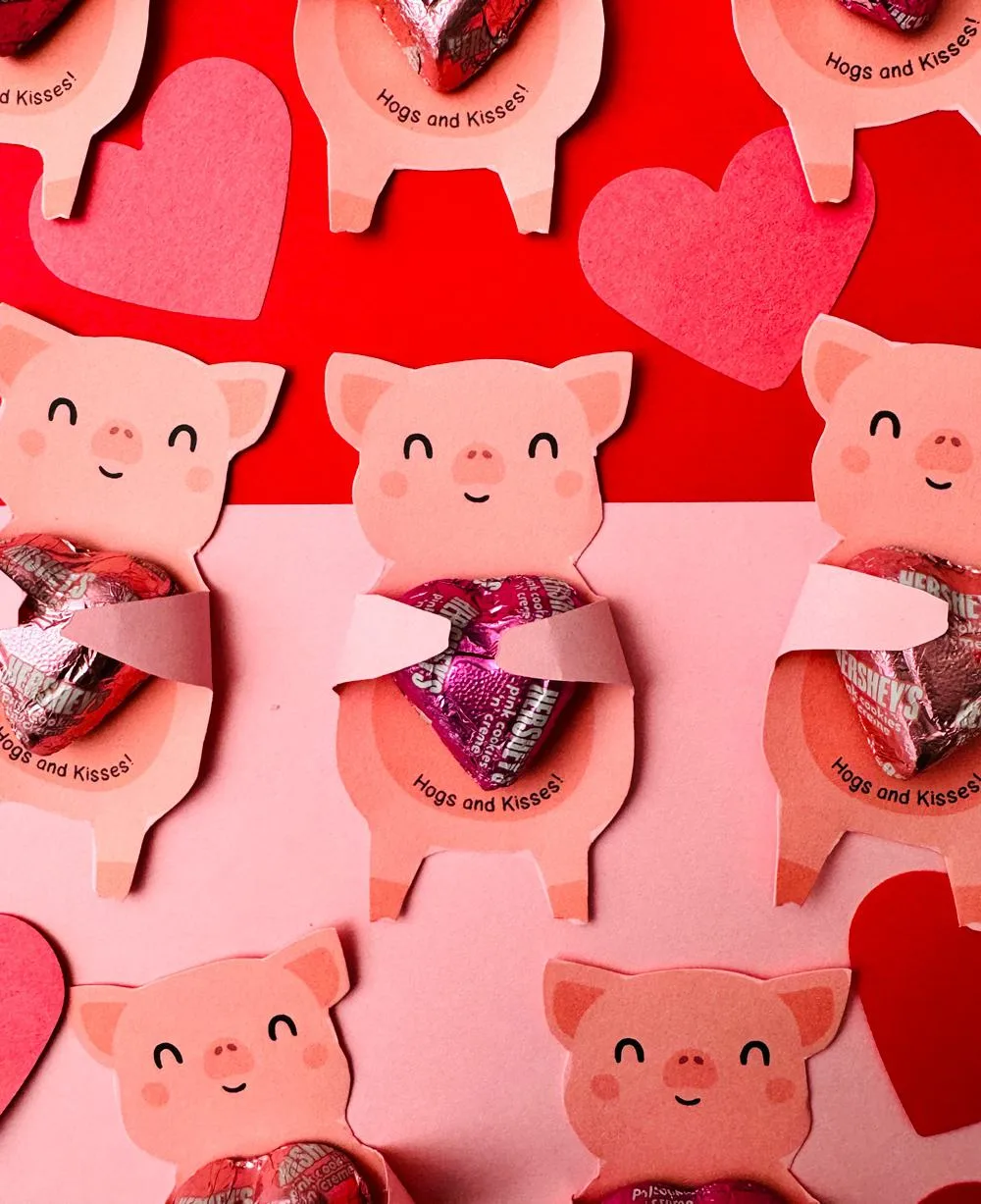 Pig Valentine Holding Hearts