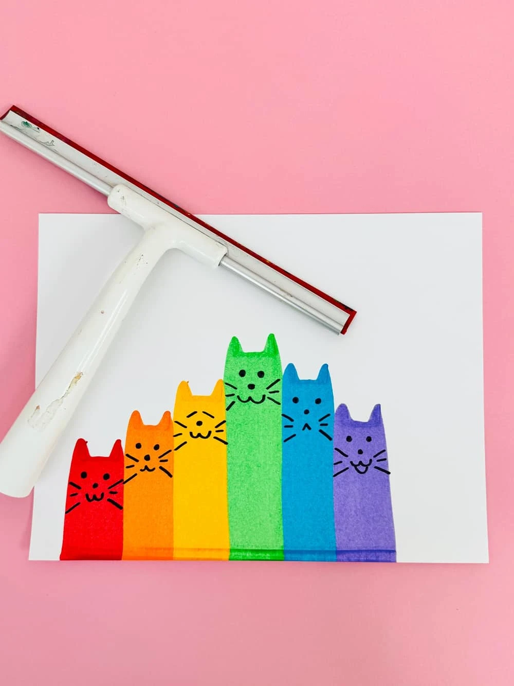 Clever Rainbow Cat Squeegee Art