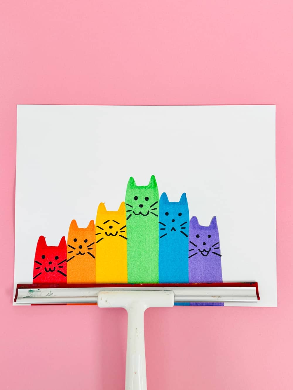 Clever Rainbow Cat Squeegee Art