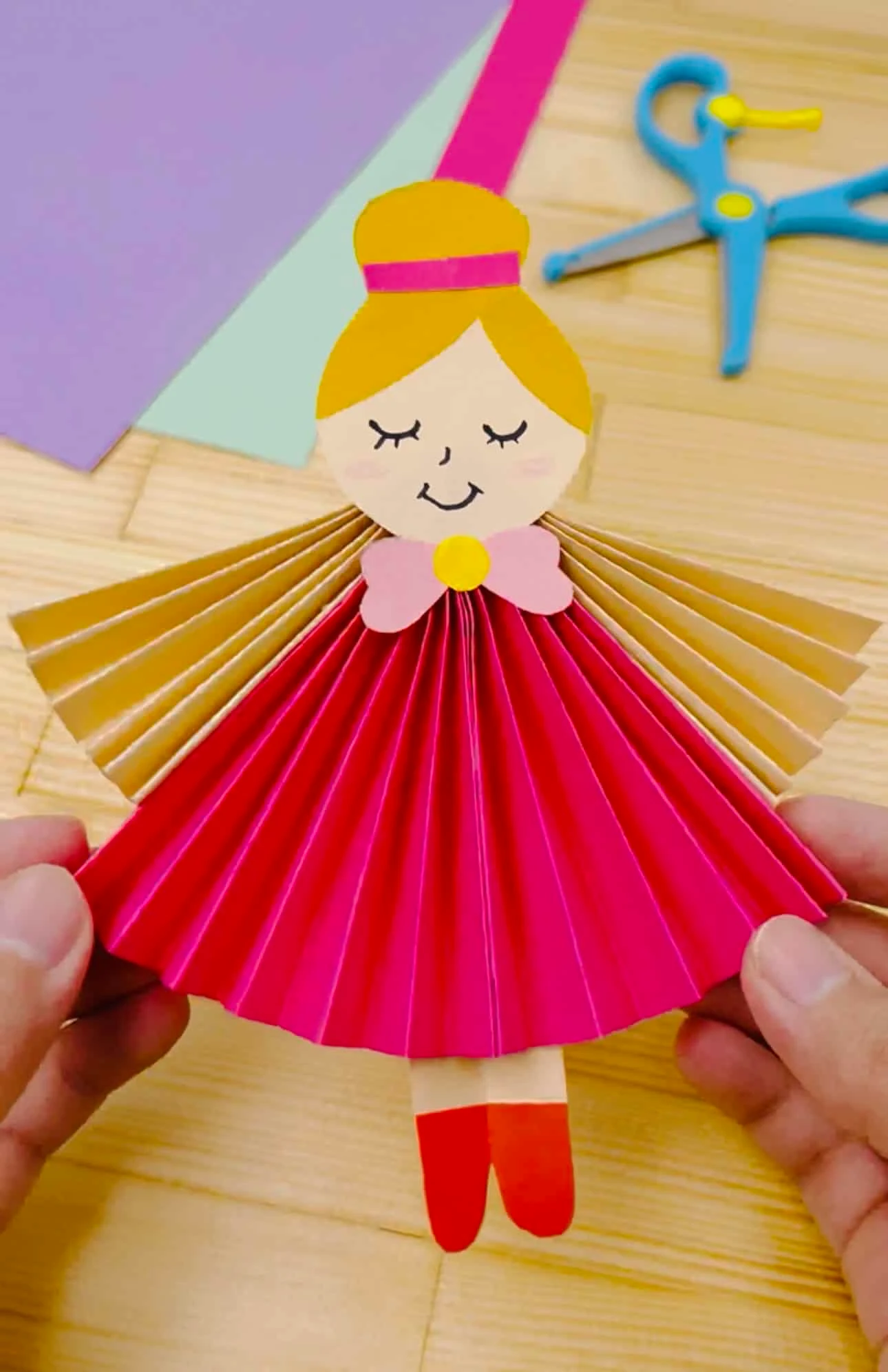 paper accordion doll